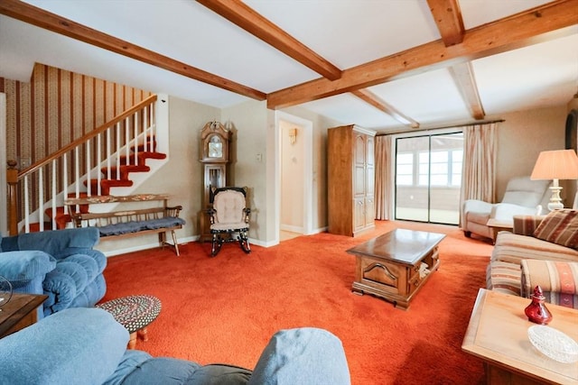 carpeted living area featuring stairs, beamed ceiling, and baseboards