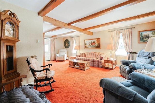 living area featuring beam ceiling and carpet flooring