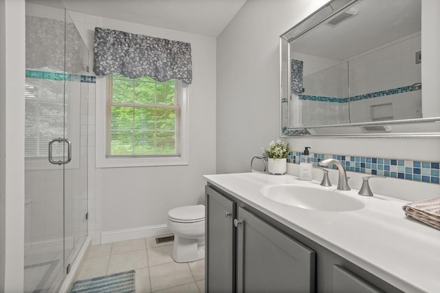 71 Fox Run Dr, Ayer, MA 01432 - full bathroom featuring vanity, toilet, tile patterned floors, a shower stall, and baseboards