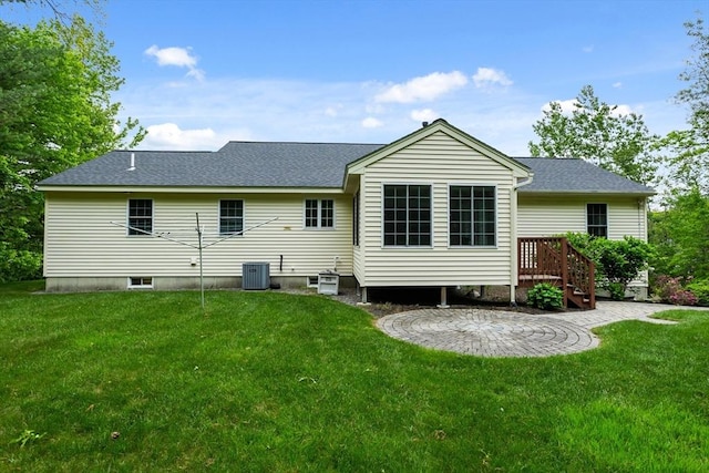 71 Fox Run Dr, Ayer, MA 01432 - back of property featuring a yard and a shingled roof