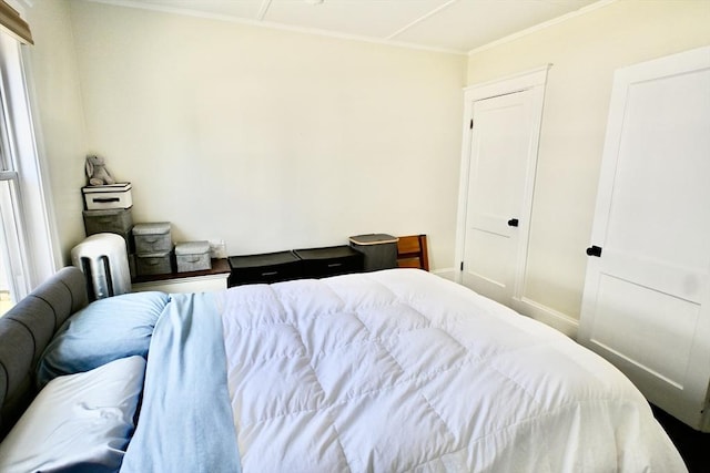 bedroom featuring ornamental molding
