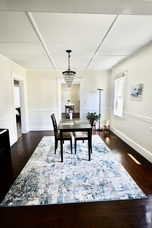 office featuring dark wood-style flooring and baseboards