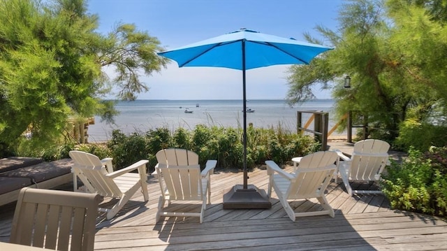 deck featuring a water view