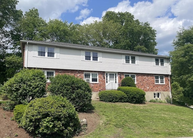 8 Zabriskie Unit 8B, Newburyport, MA 01950 - colonial home featuring brick siding and a front lawn