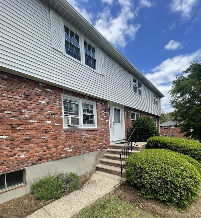 8 Zabriskie Unit 8B, Newburyport, MA 01950 - view of front of house featuring brick siding and cooling unit