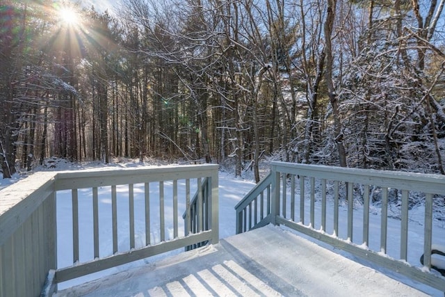 view of snow covered deck