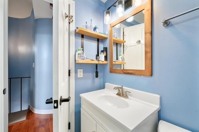 12 Stoneholm Unit 621, Boston, MA 02115 - half bath featuring vanity and wood finished floors