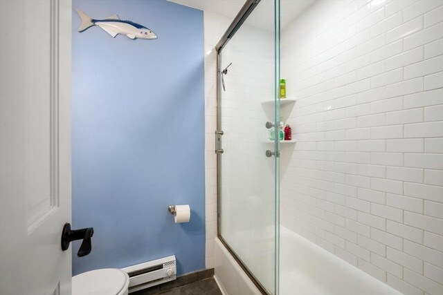12 Stoneholm Unit 621, Boston, MA 02115 - full bath featuring a baseboard radiator and combined bath / shower with glass door