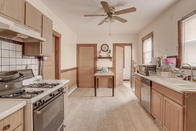 69 Metropolitan Ave, Boston, MA 02131 - kitchen with white gas stove, dishwasher, under cabinet range hood, light wood-type flooring, and wainscoting