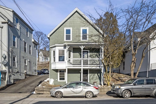 view of front property with a balcony