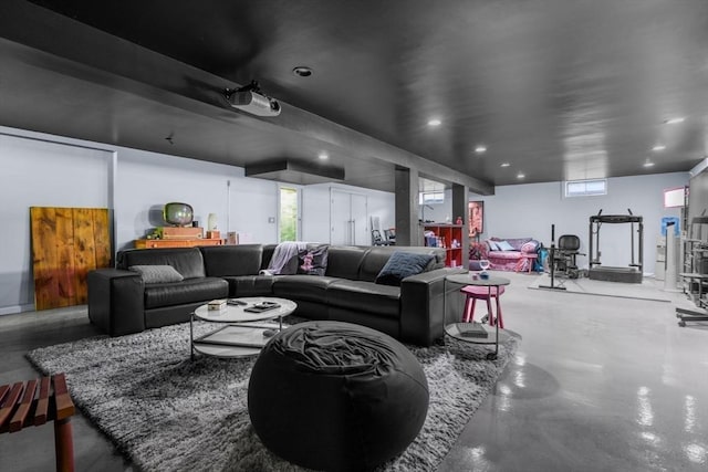 living room with concrete flooring