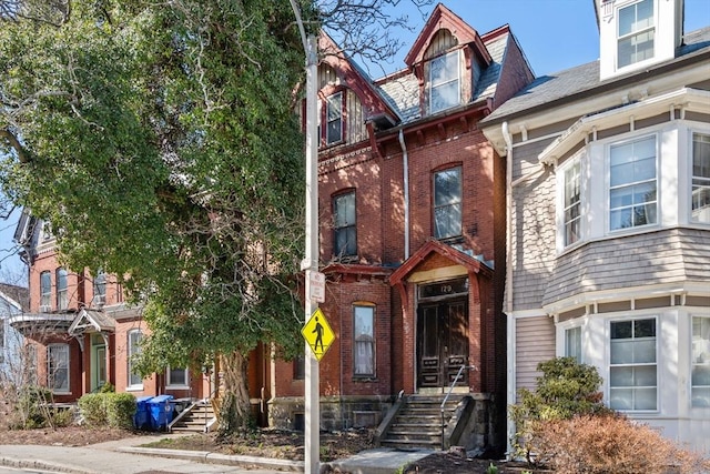 view of front of property with brick siding
