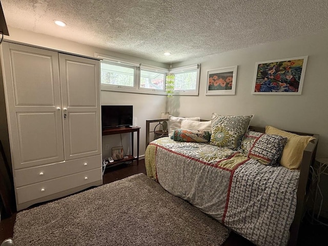 12 Cherry Rd, Goshen, MA 01032 - bedroom with a textured ceiling, dark wood-style floors, and recessed lighting
