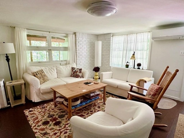 12 Cherry Rd, Goshen, MA 01032 - living area featuring an AC wall unit and dark wood-style flooring