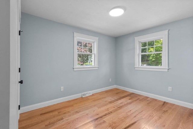 7 Grove St, Westford, MA 01886 - empty room featuring light wood-style floors and baseboards
