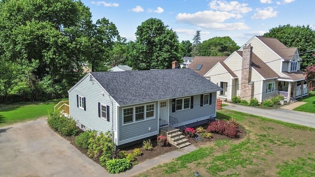 7 Grove St, Westford, MA 01886 - bungalow featuring a shingled roof, a front lawn, entry steps, and driveway