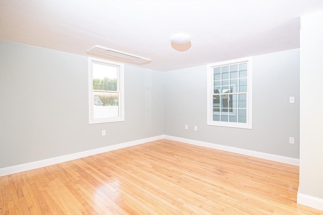 29 Roanoke St, Lynn, MA 01904 - empty room with light wood finished floors and baseboards