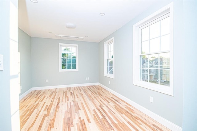 29 Roanoke St, Lynn, MA 01904 - empty room with light wood-style flooring and baseboards