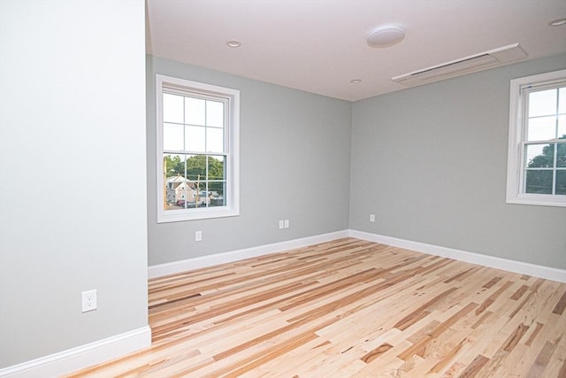 29 Roanoke St, Lynn, MA 01904 - empty room with wood finished floors and baseboards