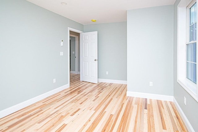 29 Roanoke St, Lynn, MA 01904 - empty room featuring wood finished floors and baseboards