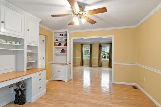 93 Towne Hill Rd, Haverhill, MA 01835 - mudroom featuring built in desk, a ceiling fan, light wood-type flooring, baseboards, and ornamental molding
