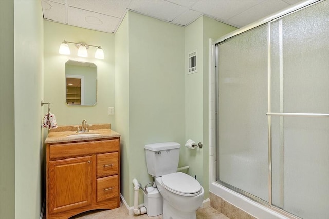 93 Towne Hill Rd, Haverhill, MA 01835 - full bathroom featuring a stall shower, toilet, a paneled ceiling, vanity, and baseboards