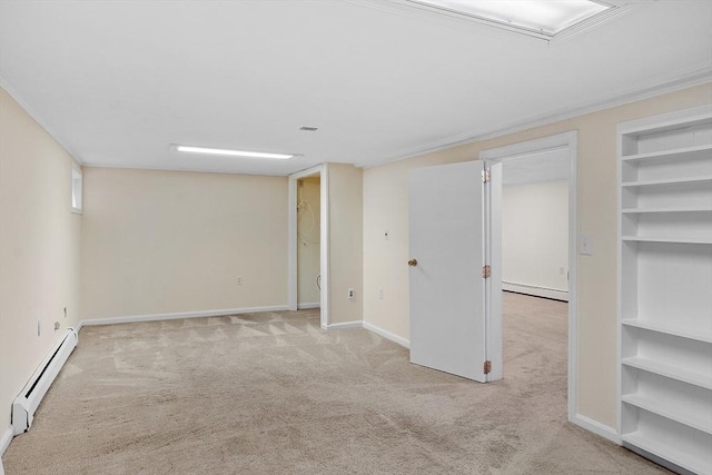 interior space featuring built in features, a baseboard heating unit, carpet flooring, a baseboard radiator, and baseboards