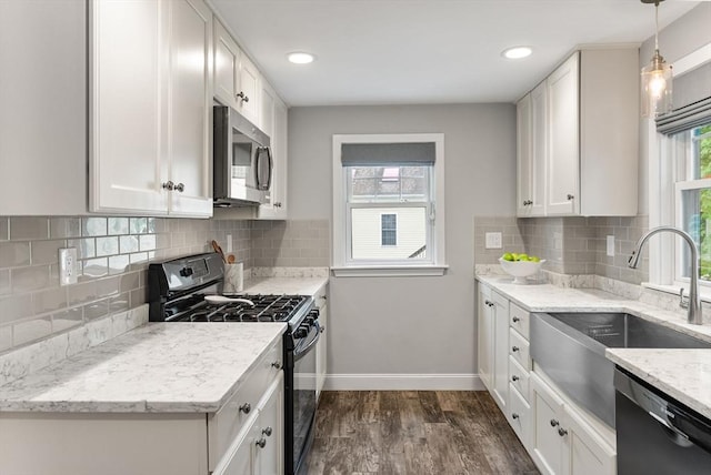 571 Washington St, Winchester, MA 01890 - kitchen with black appliances, a sink, dark wood finished floors, white cabinetry, and recessed lighting