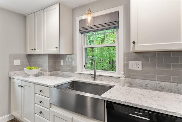 571 Washington St, Winchester, MA 01890 - kitchen with a sink, dishwasher, white cabinetry, and light stone counters