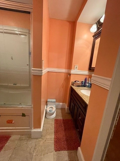 bathroom with a shower and vanity