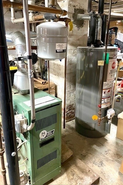 utility room featuring gas water heater