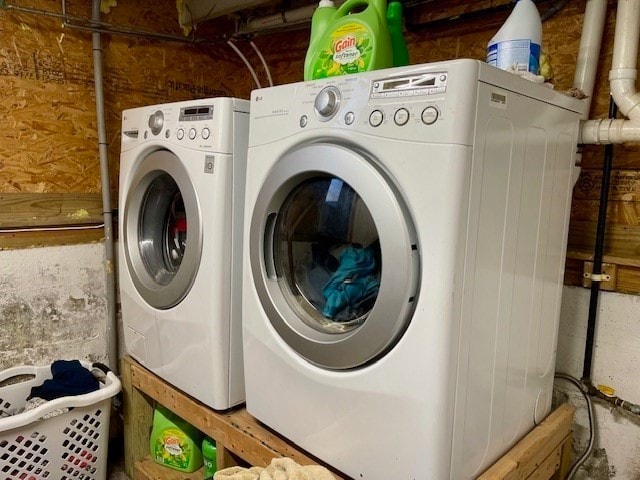 washroom featuring separate washer and dryer