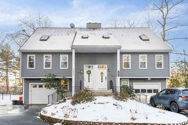 view of front of home featuring a garage