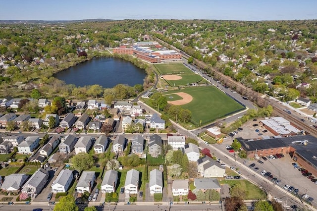 aerial view of property's location featuring a nearby body of water