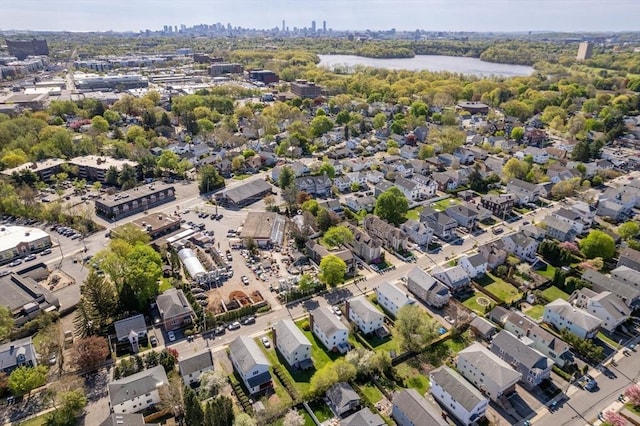 aerial view of property's location featuring a large body of water