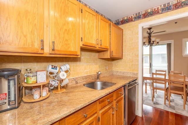 200 Falls Blvd Unit F305, Quincy, MA 02169 - kitchen featuring dishwasher, a sink, dark wood-style flooring, light stone counters, and a chandelier