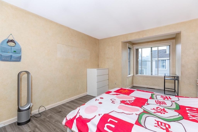 200 Falls Blvd Unit F305, Quincy, MA 02169 - bedroom with wood finished floors and baseboards
