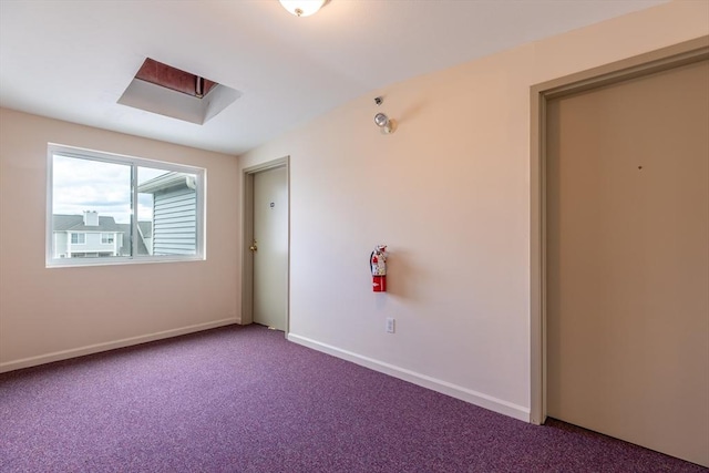 200 Falls Blvd Unit F305, Quincy, MA 02169 - carpeted spare room featuring a skylight and baseboards