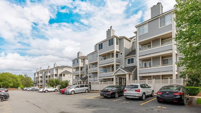 200 Falls Blvd Unit F305, Quincy, MA 02169 - view of property featuring uncovered parking