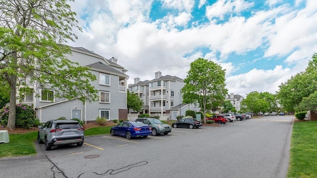 200 Falls Blvd Unit F305, Quincy, MA 02169 - view of asphalt road featuring a residential view