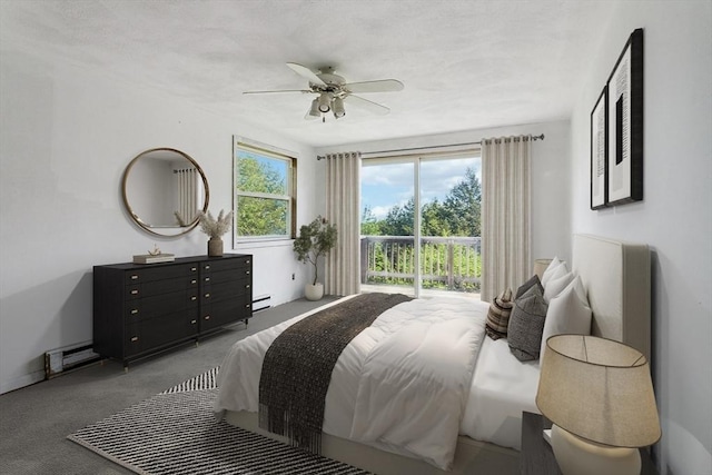bedroom featuring baseboard heating, access to outside, carpet floors, and ceiling fan