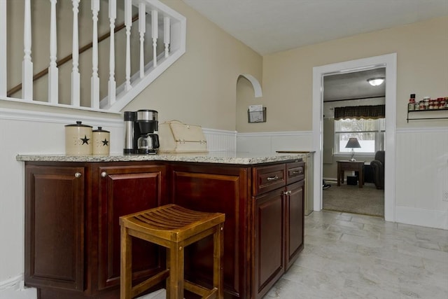 bar with a wainscoted wall