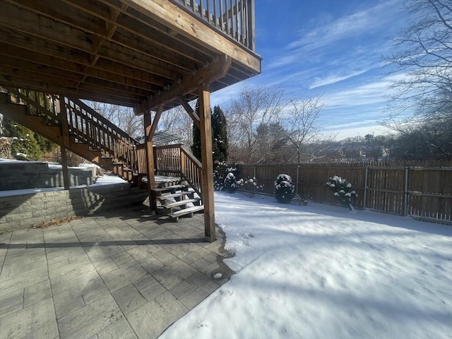 view of snow covered patio