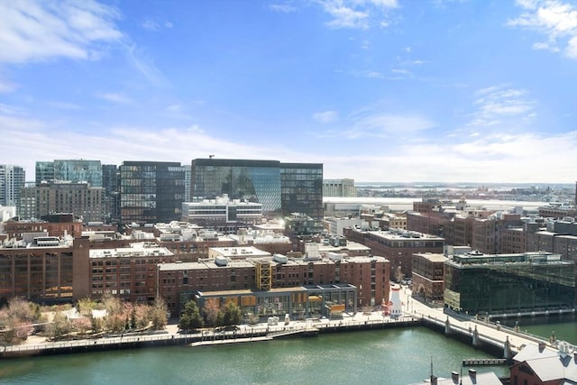 aerial view featuring a water view and a view of city