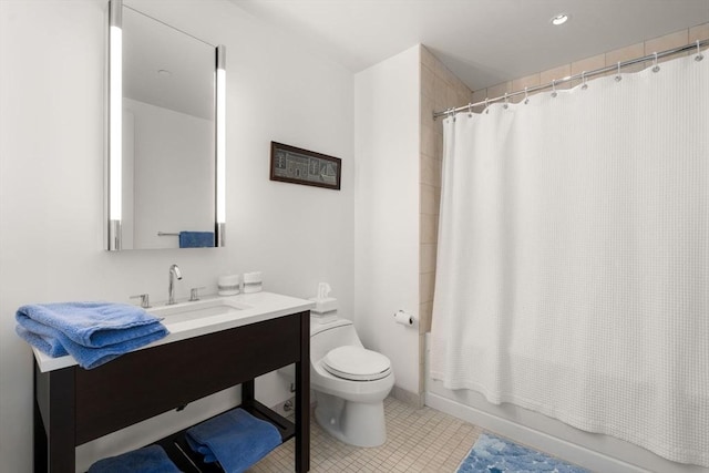full bath with tile patterned floors, shower / bathtub combination with curtain, vanity, and toilet
