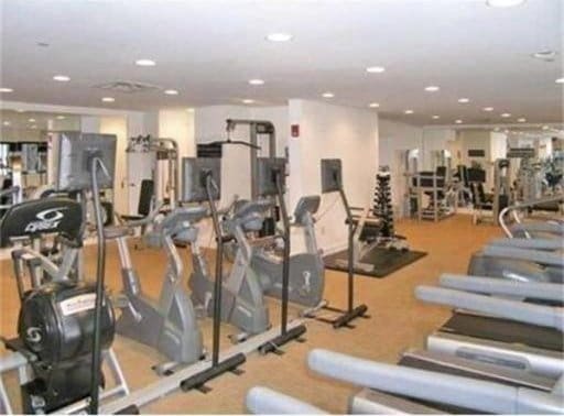 gym featuring recessed lighting