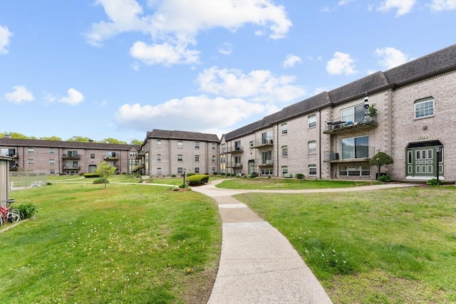 108 Oak Ln Unit 3, Brockton, MA 02301 - view of community with a lawn and a residential view