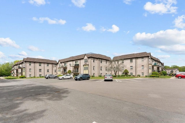 108 Oak Ln Unit 3, Brockton, MA 02301 - view of apartment building / complex with uncovered parking