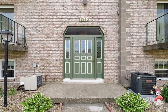 108 Oak Ln Unit 3, Brockton, MA 02301 - entrance to property with central AC and brick siding