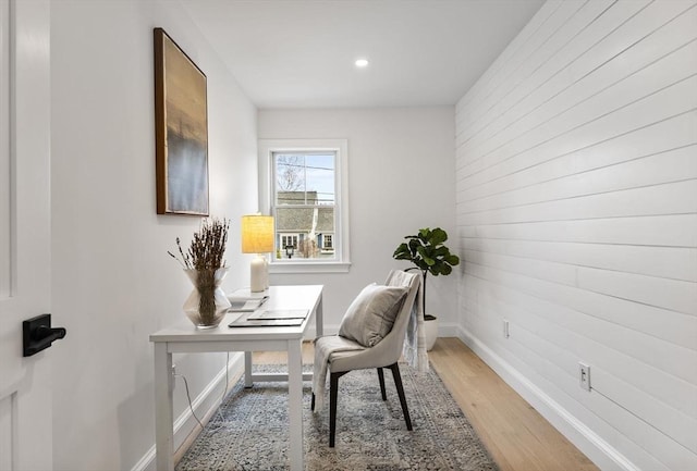 office area featuring recessed lighting, baseboards, and light wood finished floors